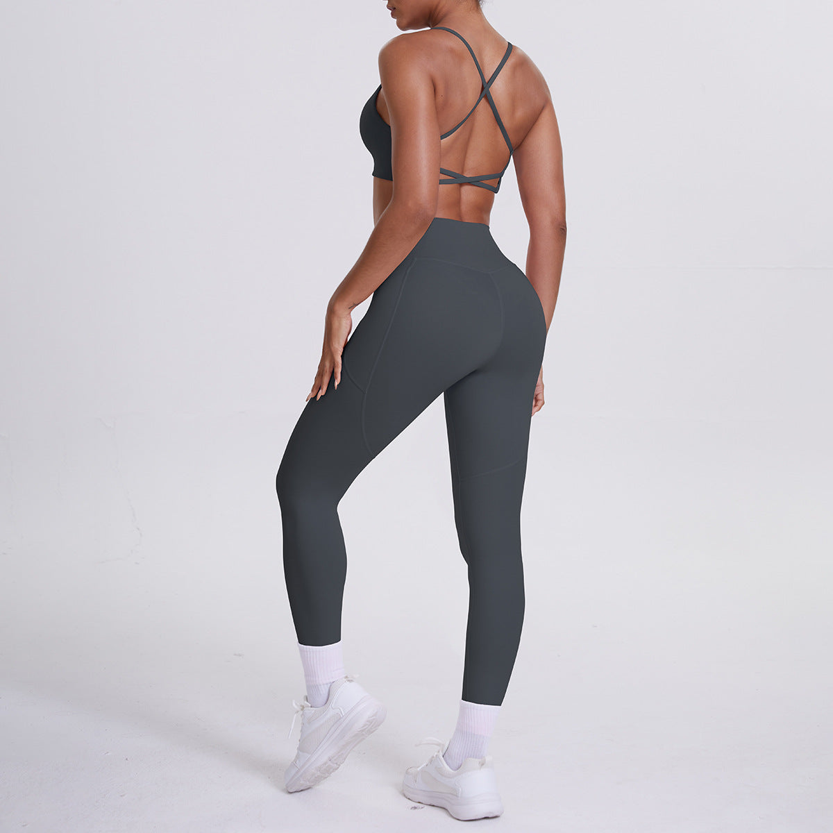 Spot European and American nude sports pocket trousers sexy suspenders sports beautiful back running fitness pants yoga suit set