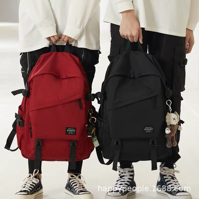 New backpack male trend street Korean version simple female student schoolbag leisure computer bag travel bag LOGO