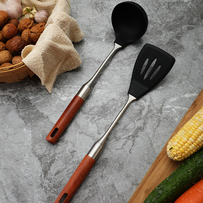 Daoqi 304 stainless steel silicone kitchenware high temperature food grade wooden handle spatula household kitchen fishing spoon