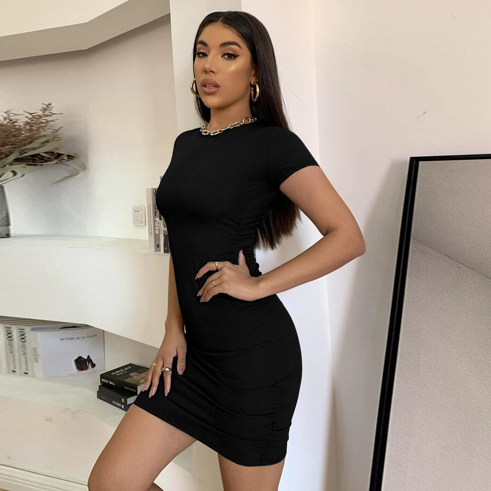 European and American  women's clothing sexy wind backless knitted dress summer new round neck pullover one-step short skirt women