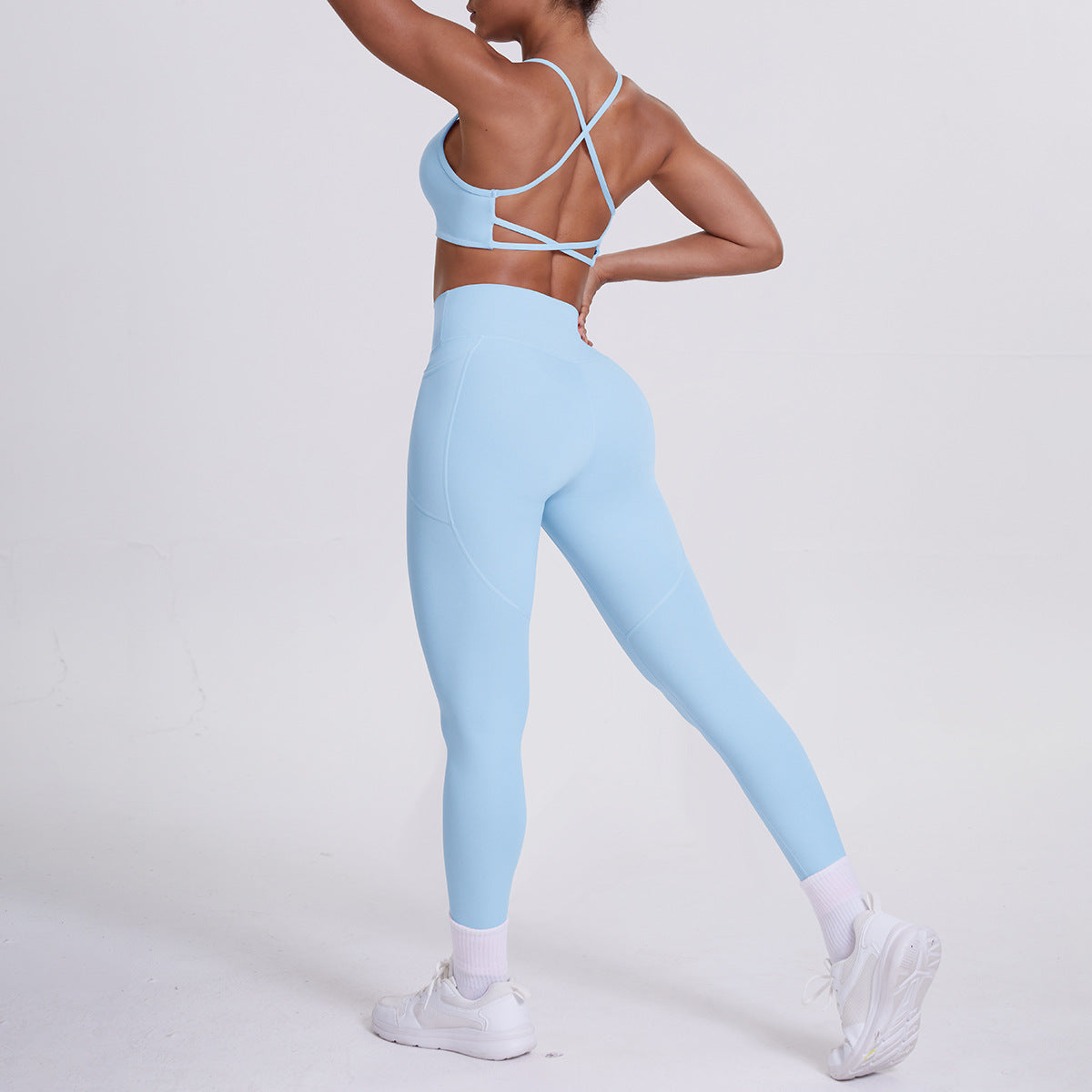 Spot European and American nude sports pocket trousers sexy suspenders sports beautiful back running fitness pants yoga suit set