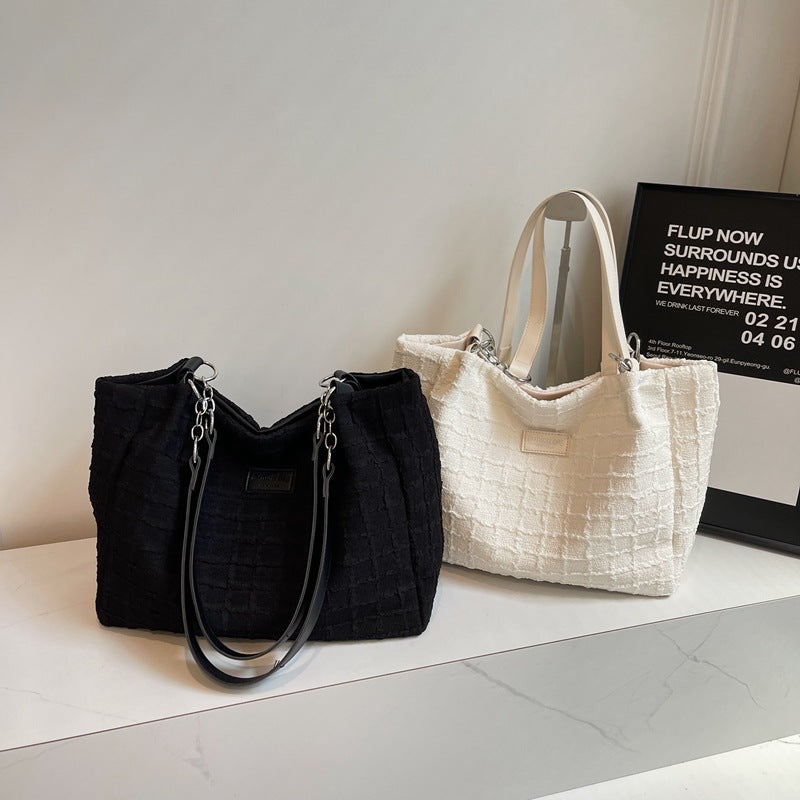 Canvas tote bag women's large capacity 2025 new casual shoulder bag summer versatile senior sense class commuter bag