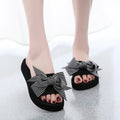 Women's slippers 2025 summer new style outdoor wear thick sole fashion bowknot one-strap wedge heel floral sandals