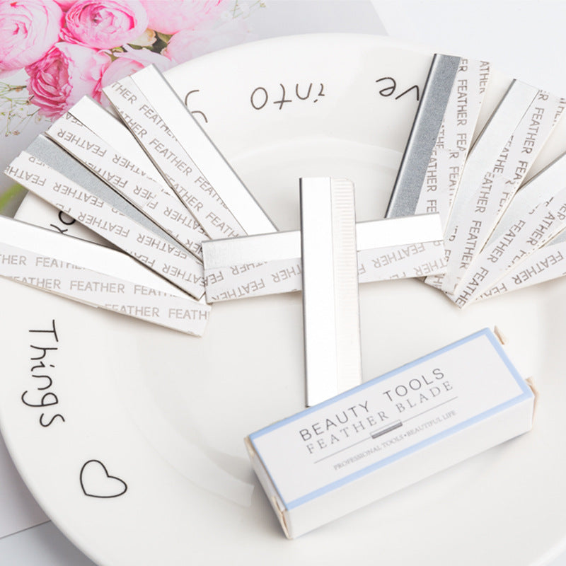 Ready-to-ship wholesale folding eyebrow razor with 10 replacement blades included. perfect for shaping eyebrows and trimming hair. a must-have beauty tool