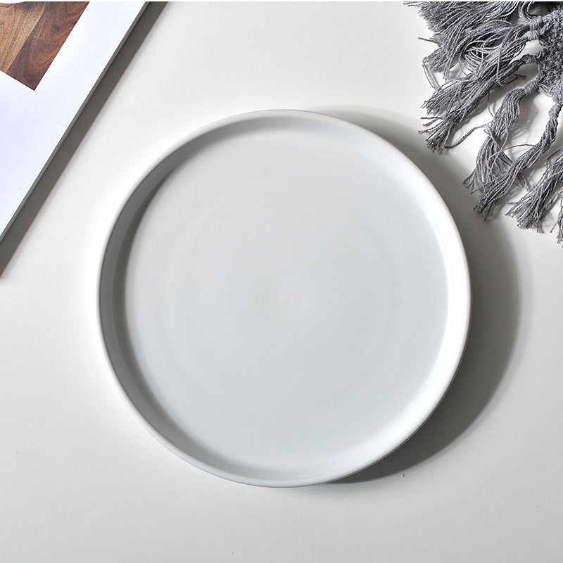 Creative matte black and white ceramic dinnerware set - plates, dishes, trays - perfect for home use, breakfast, cakes, western cuisine, and steak