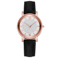 Rose gold case, white dial, black strap