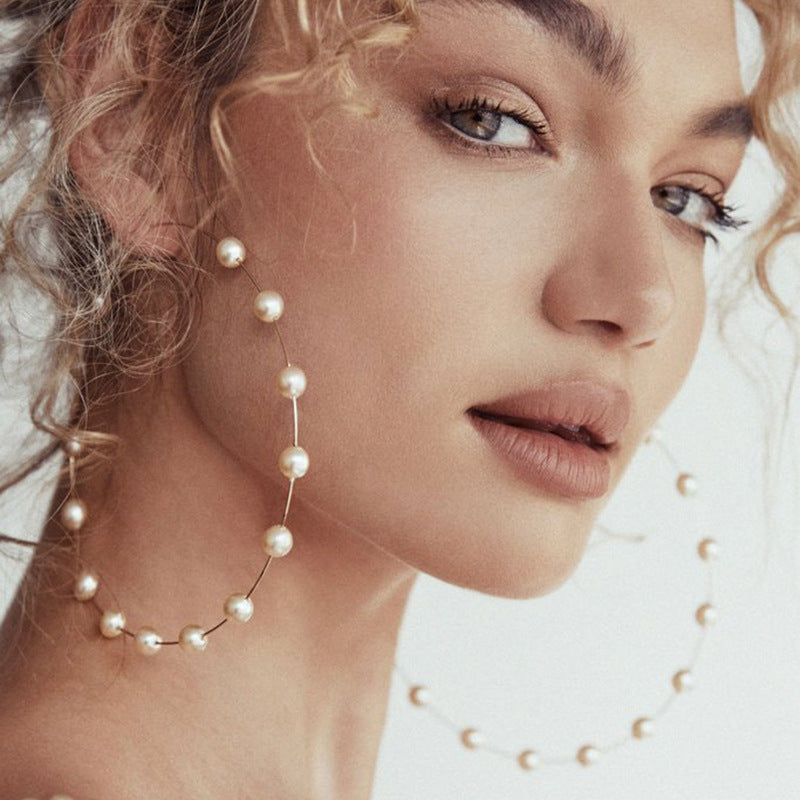 Pearl earrings wholesale european and american cross-border alloy silver jewelry women's niche rings exaggerated stylish high-end earrings