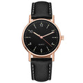 Rose gold case, black dial, black strap