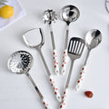 Ceramic stainless steel kitchenware decals personalized kitchen utensils hot pot spoon spatula spoon colander seven-piece set wholesale