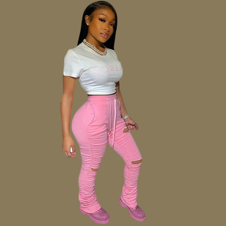 Factory hot sale: european & american style fashionable sexy butt-lifting slim-fit distressed pleated pocket micro-flare women's sweatpants