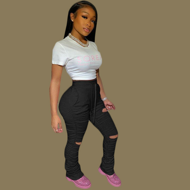 Factory hot sale: european & american style fashionable sexy butt-lifting slim-fit distressed pleated pocket micro-flare women's sweatpants