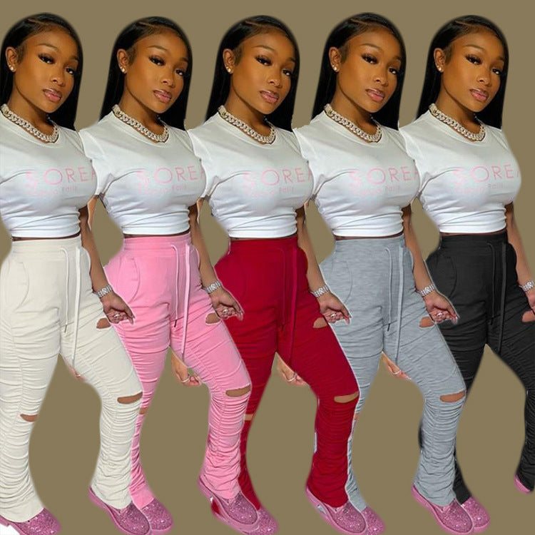 Factory hot sale: european & american style fashionable sexy butt-lifting slim-fit distressed pleated pocket micro-flare women's sweatpants