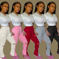 Factory hot sale: european & american style fashionable sexy butt-lifting slim-fit distressed pleated pocket micro-flare women's sweatpants