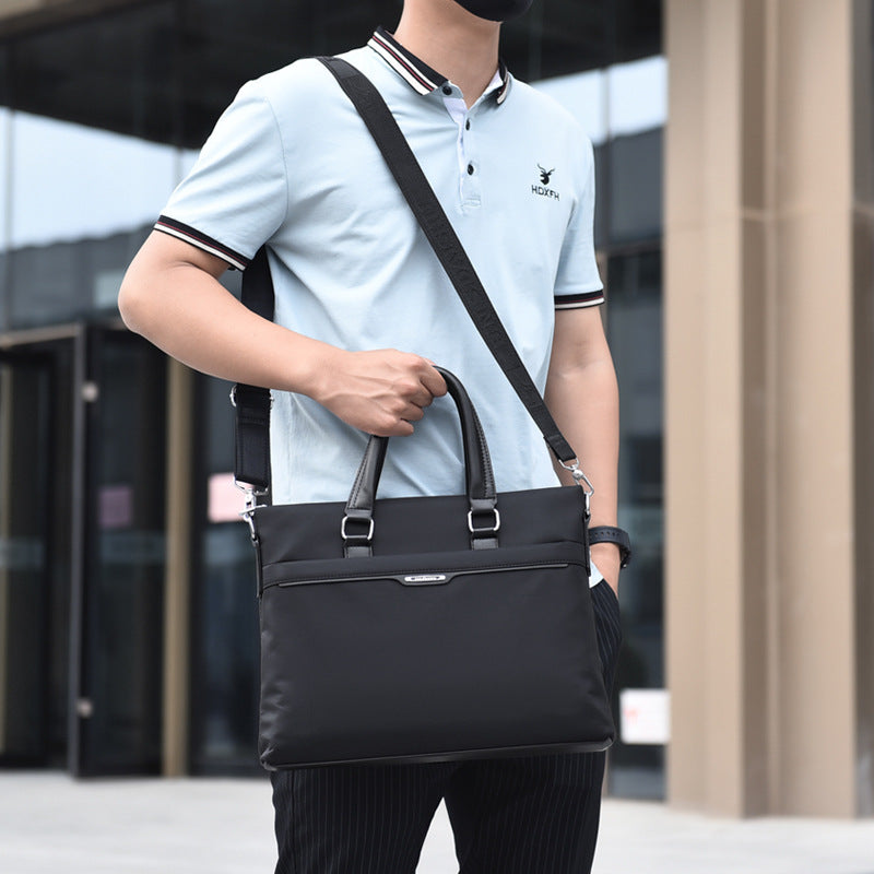New men's fashion trend bags, briefcases, business bags, large-capacity leisure bags, handbags produced by manufacturers