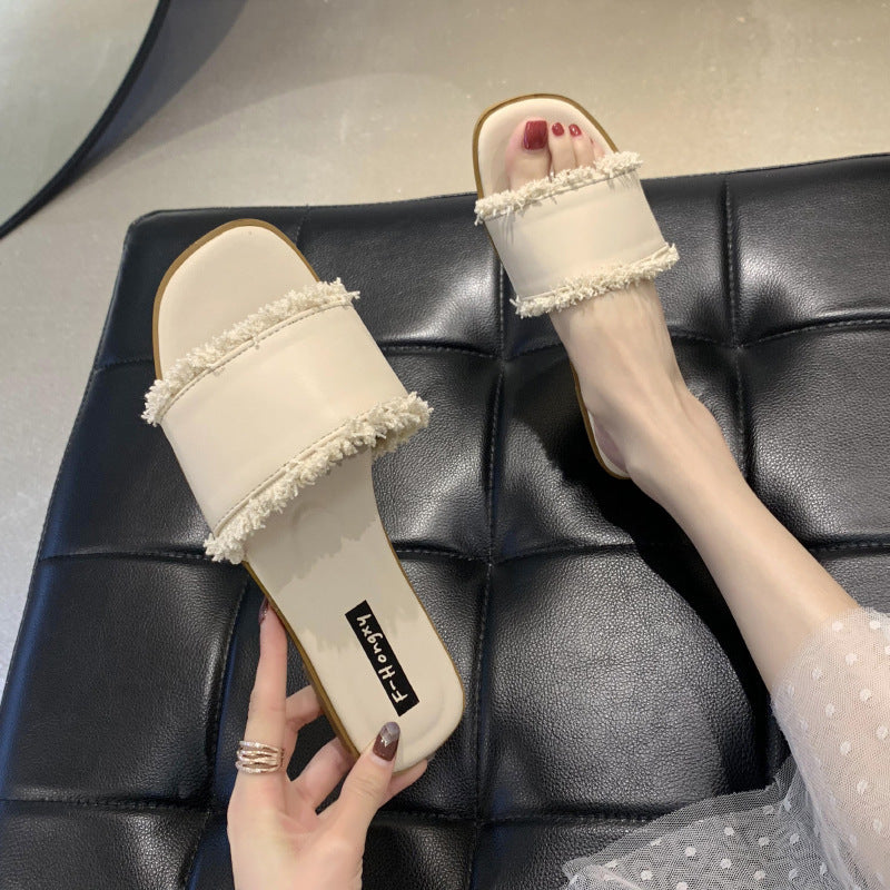 2020 summer new cool slippers women's Korean version flat-bottomed fashion outer wear one-word tassel cool slippers