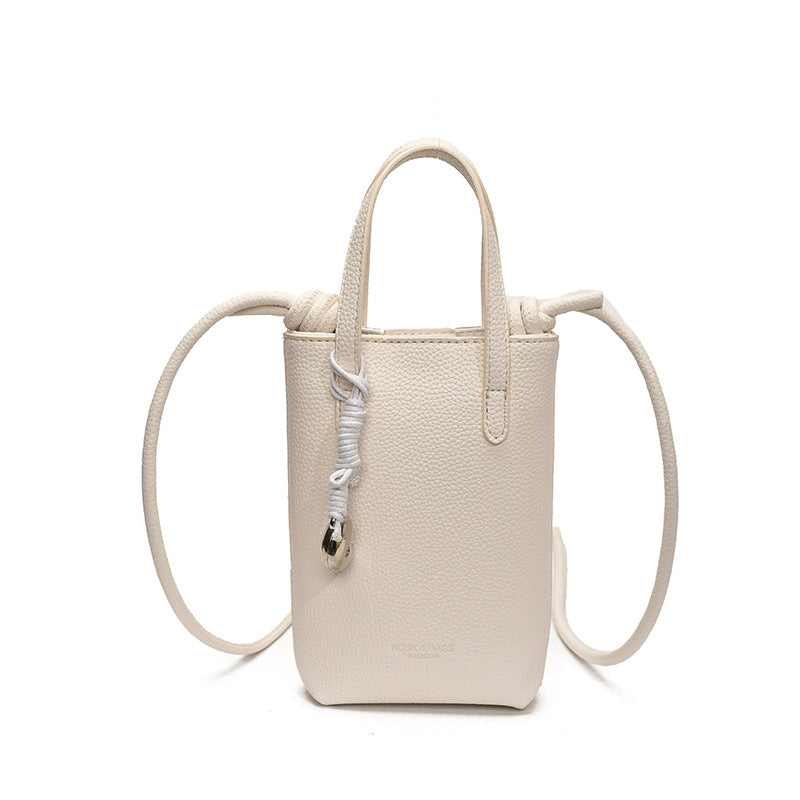 Casual simple niche portable bucket bag women's 2025 new fashion shoulder bag commuter messenger mobile phone bag