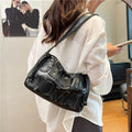 Thailand gentle woman drawstring bag women's 2026 new embossed letter shoulder bag trendy tote bag