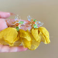 Vacation-style yellow floral fabric earrings for women, beachy colorful face-framing small earrings, statement earrings, unique and eye-catching ear accessories