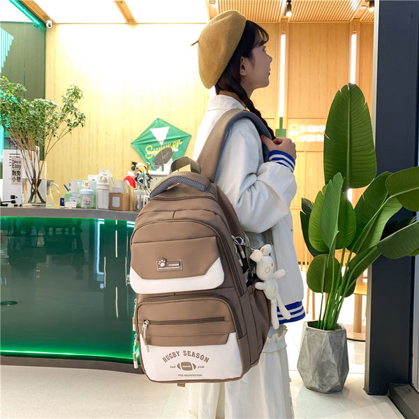 Wholesale college student schoolbag large-capacity backpack strong and durable waterproof junior high school student travel computer backpack