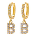 European and american gold-plated micro-paved zircon 26-letter initial pendant earrings - fashionable, unique, high-end, and chic hoop earrings with tassel detail