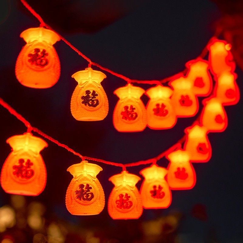 LED lantern string, Chinese New Year lanterns, Spring Festival flashing lights, festive Lantern Festival, New Year's fringed red lanterns