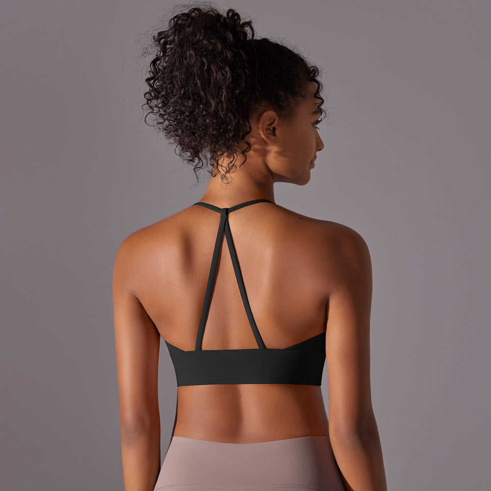 Naked sensation strappy yoga bra - triangle back, push-up, shaping sports bra - workout top for yoga and fitness