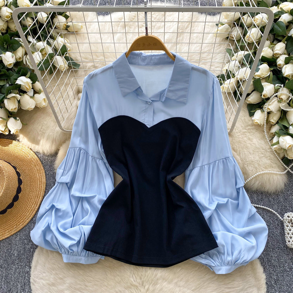 French-inspired, faux two-piece top for women, perfect for autumn. features a soft, feminine style with pleated lantern sleeves and a flattering, slim-fit design. a trendy and chic blouse