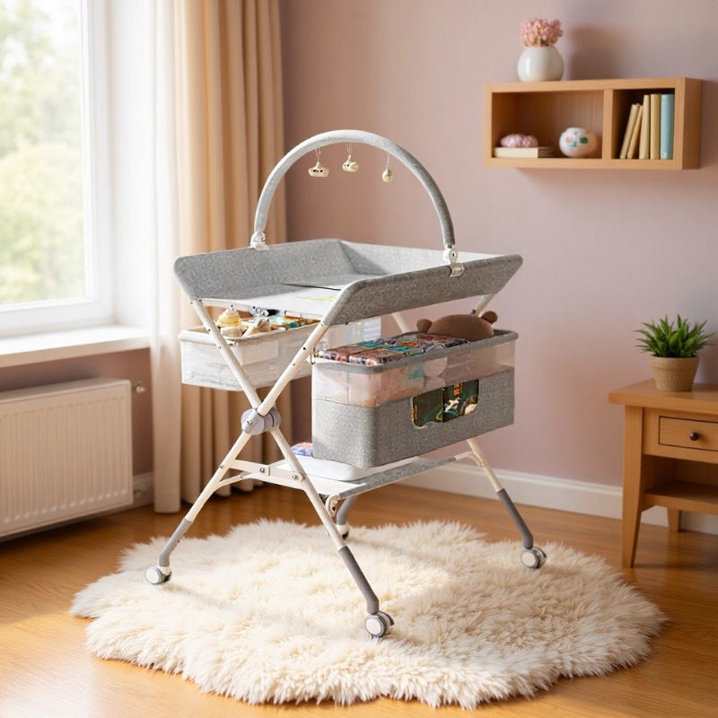 Baby changing table - newborn diaper changing, bathing, massage, and bed - foldable multifunctional baby bed