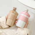 Portable, stylish water bottle - trendy glass straw cup with cute cartoon design, perfect as a souvenir or gift, includes lid