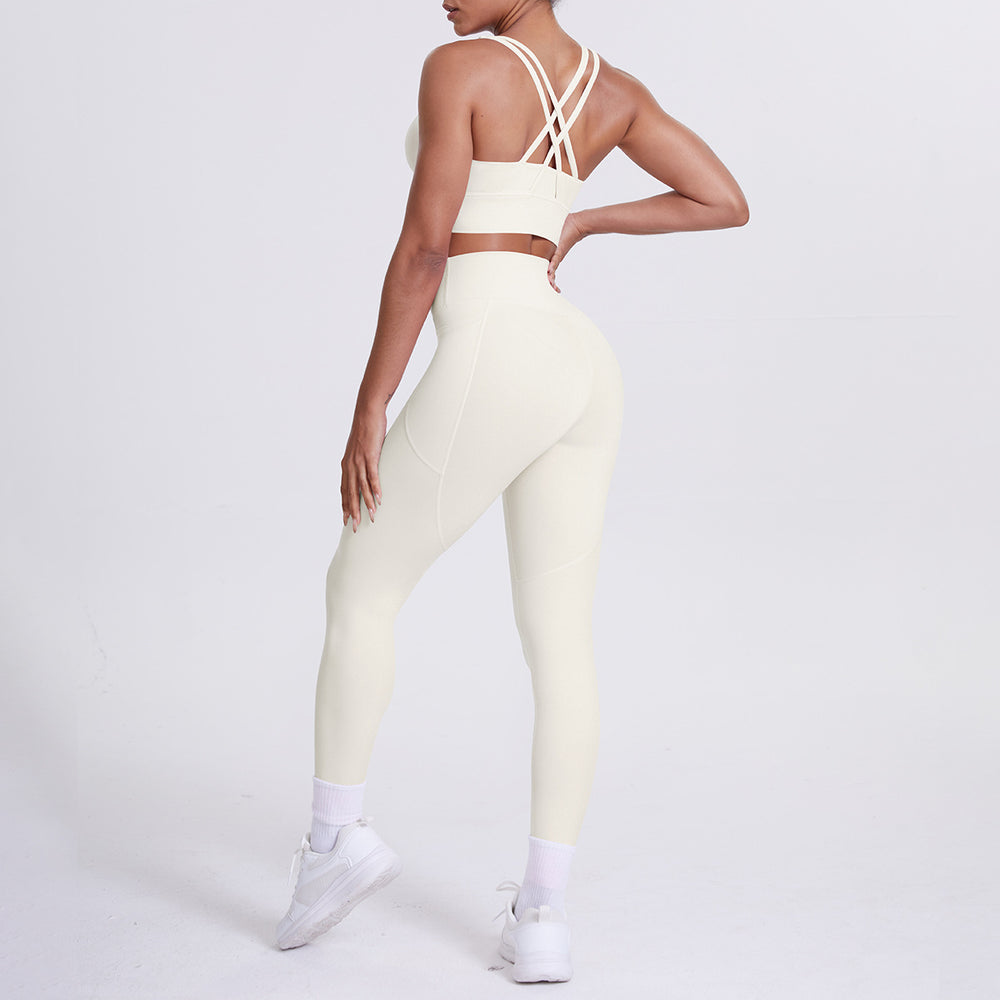 Fashion cross-border nude brushed cross back bra sports hip pocket pants fitness yoga clothes two-piece set