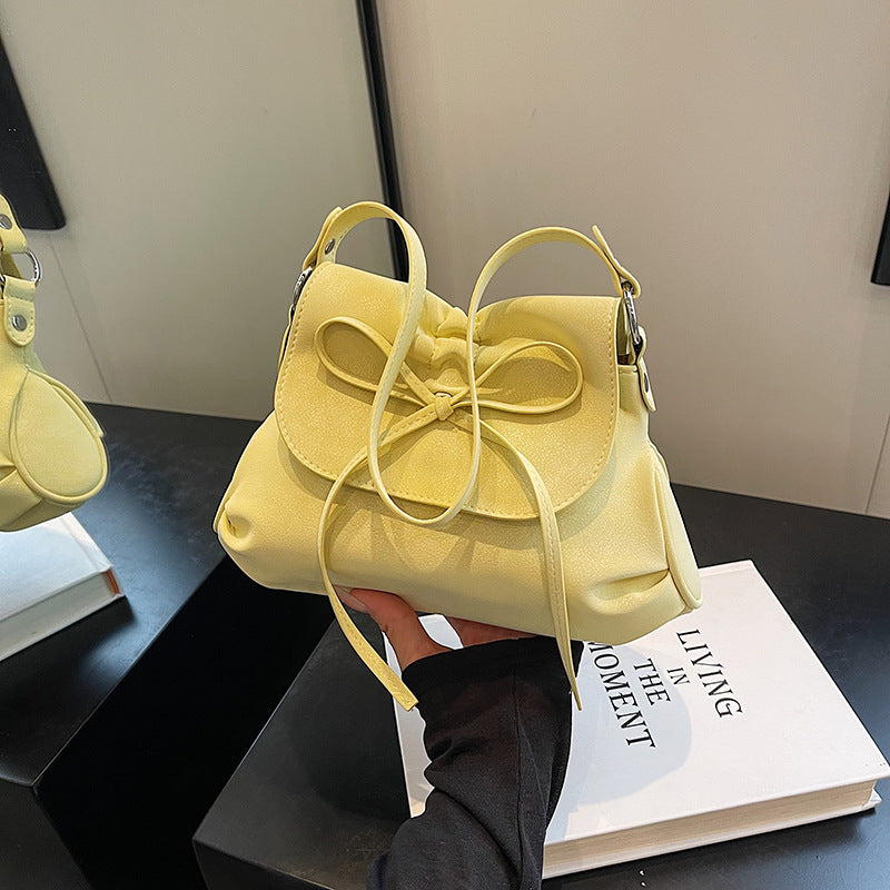 Solid color versatile bow small square bag women's bag 2025 new fashion simple shoulder bag foreign style portable commuter bag