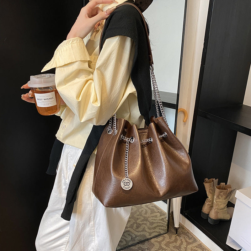 Soft leather handbag 2025 new women's bag simple retro small leather bag fashion cosmetic bag solid color chain diagonal backpack