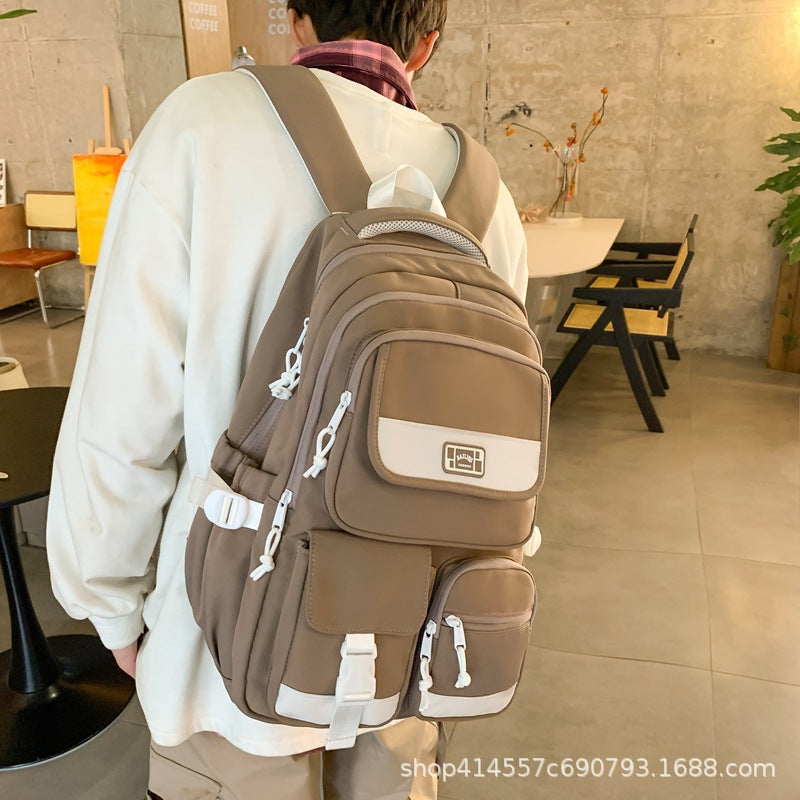 Backpack with multiple flap pocket pants design, junior high school student school bag, travel couple, large capacity, wear-resistant and dirt-resistant, campus style