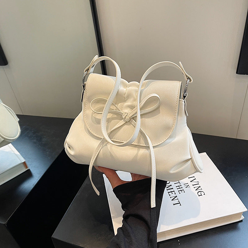 Solid color versatile bow small square bag women's bag 2025 new fashion simple shoulder bag foreign style portable commuter bag