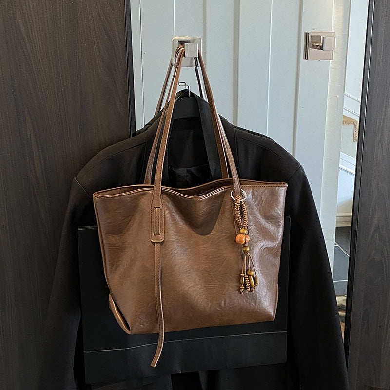 High-end retro soft leather women's bag 2026 new simple tote bag cross-border easiest for matchpure color handbag armpit bag