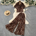 Leopard print vacation-ready two-piece set: summer chic, high-waisted wide-leg pants, effortlessly stylish and youthful