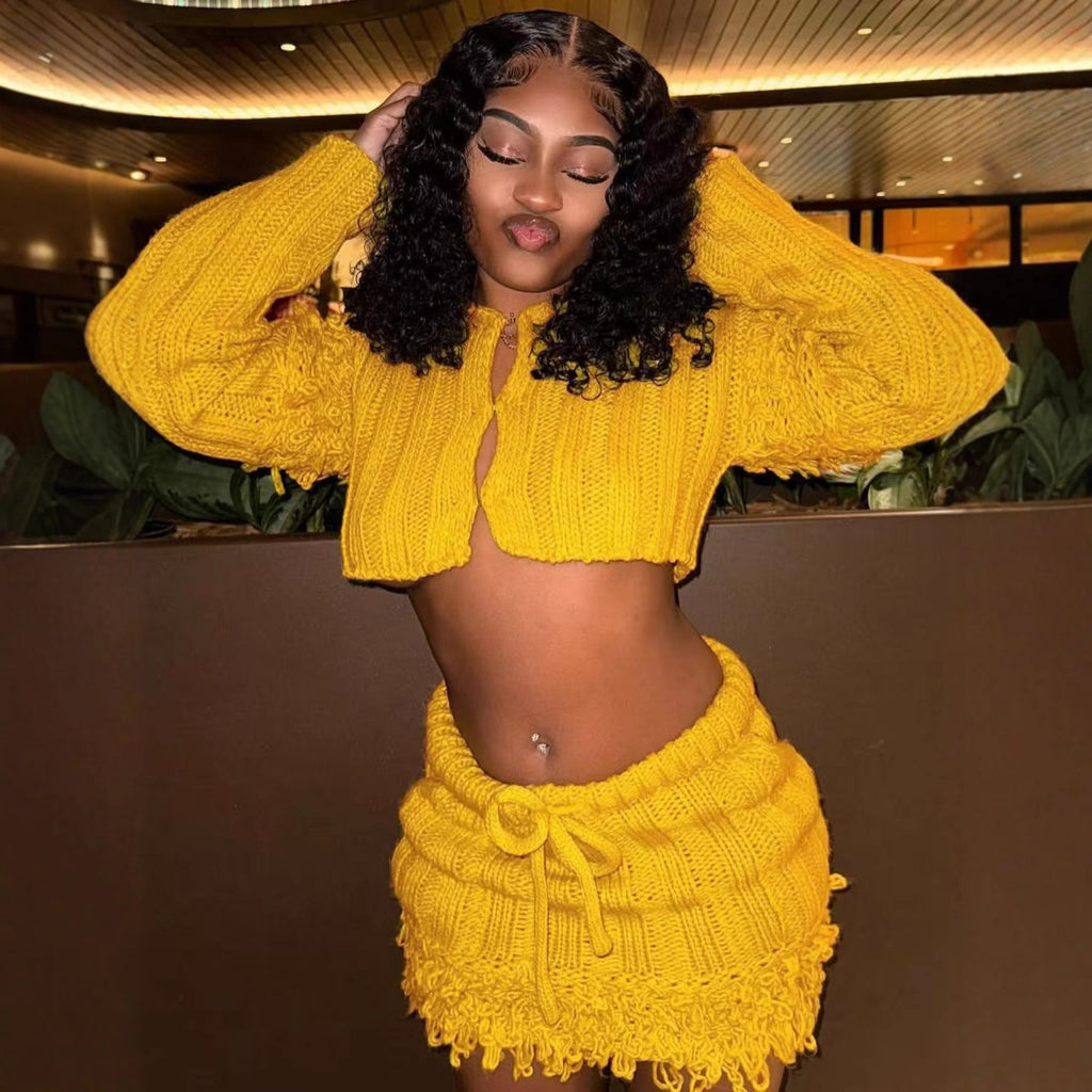 Cross-border Europe, America and 2025 new women's clothing sweet and spicy casual solid color open navel long-sleeved cardigan fringed skirt two-piece set