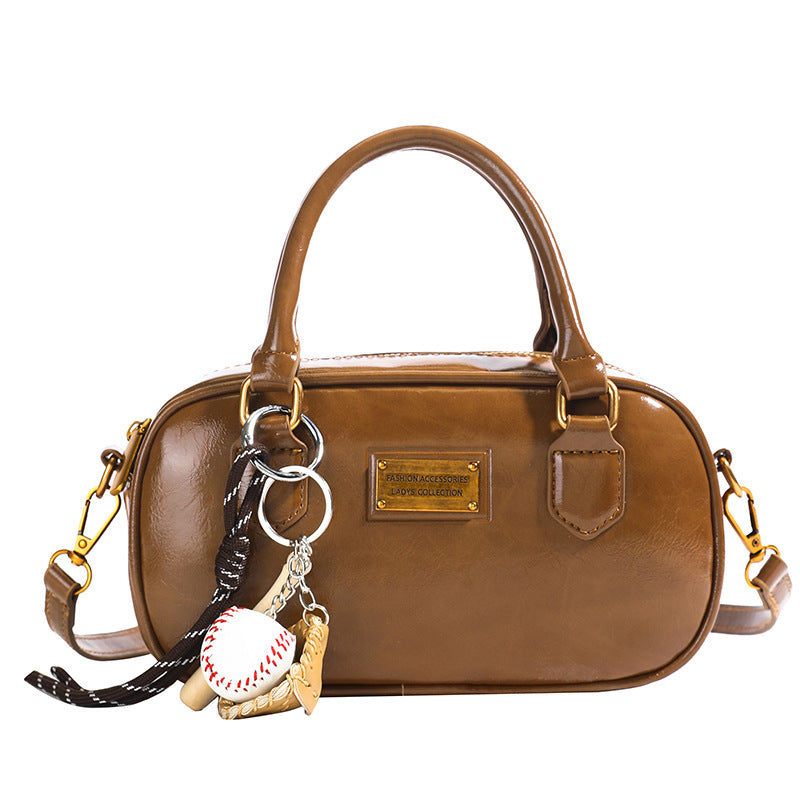 Spring new trend casual shoulder handle women's Korean version fashion commuter women's messenger bag versatile bowling bag