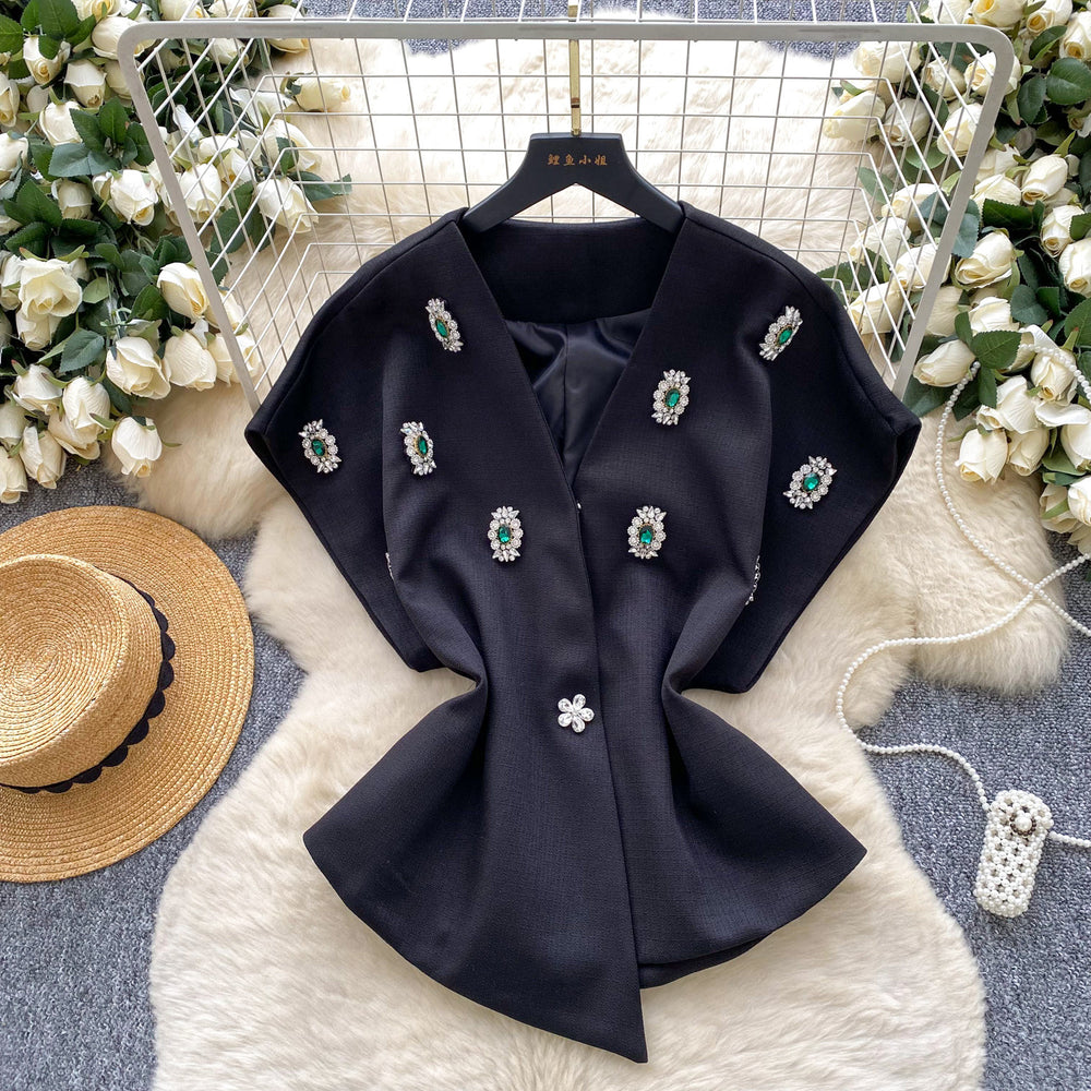 Elegant chanel-inspired, high-end, meticulously crafted, diamond-studded v-neck, short-sleeved, waist-cinching jacket for women. a chic and sophisticated french-style blazer vest, perfect for winter