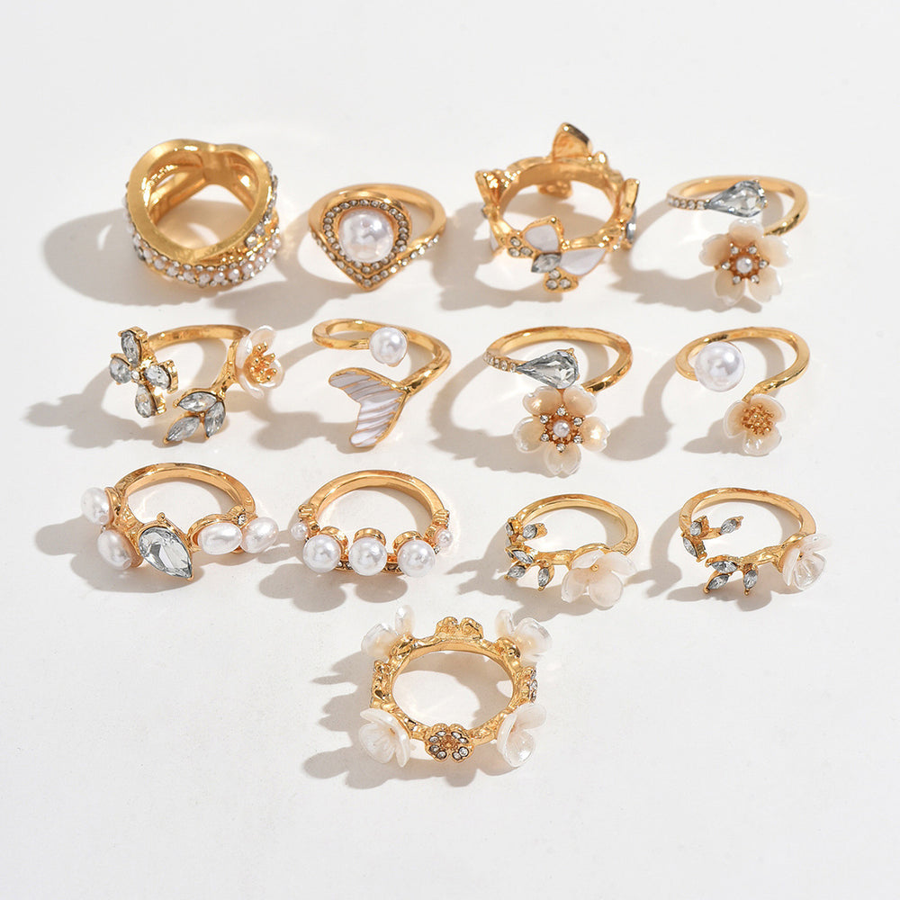 Vintage-inspired floral ring set - 13 piece collection. unique, high-end, and versatile. features faux pearls and diamond accents