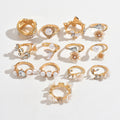 Vintage-inspired floral ring set - 13 piece collection. unique, high-end, and versatile. features faux pearls and diamond accents