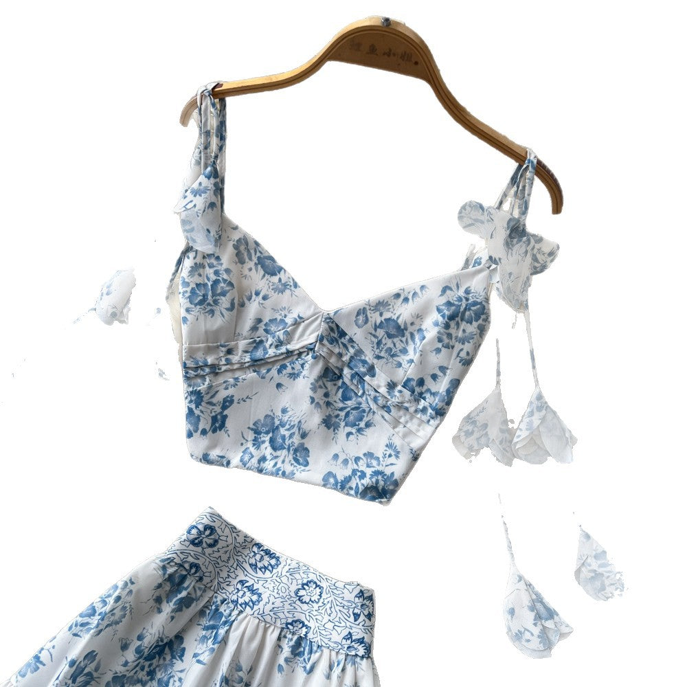Vacation-ready blue floral two-piece set: women's summer high-waisted maxi skirt outfit - perfect for a garden getaway