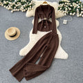 European chic: elegant and high-end strappy waist blazer-style knit top with high-waisted wide-leg pants