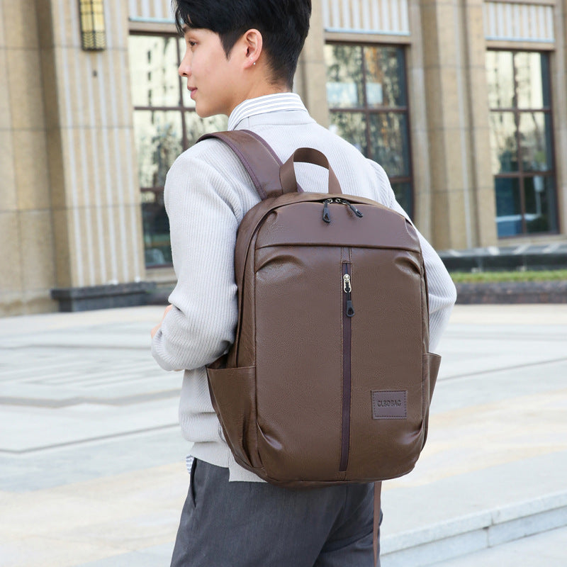 New business Korean version of junior high school students backpack men's large capacity simple PU outdoor travel computer backpack