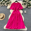 French-inspired, niche v-neck dress with ruched waist, puff sleeves, and a flowy, a-line silhouette. perfect for a slimming and elegant summer look