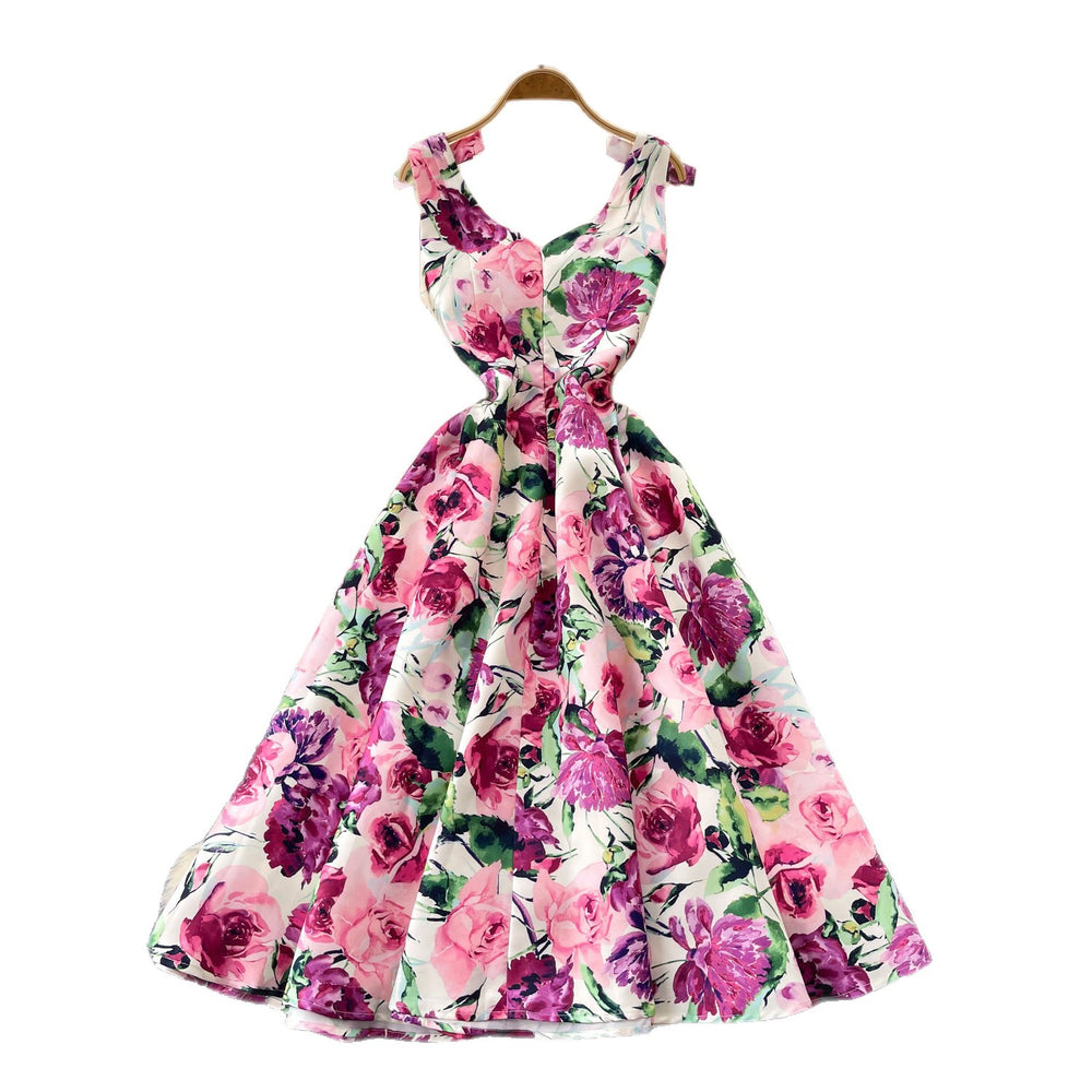 High-end floral print sleeveless dress for women, perfect for summer. elegant, high-waisted, and figure-flattering a-line silhouette, ideal for a sophisticated vacation look