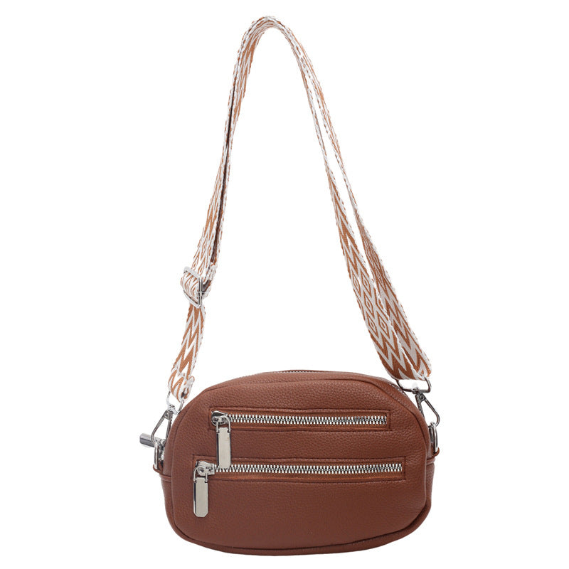 Cross-border Korean version of the new girl's mobile phone breast bag, simple pu messenger bag, trendy fashion zipper women's shoulder small round bag