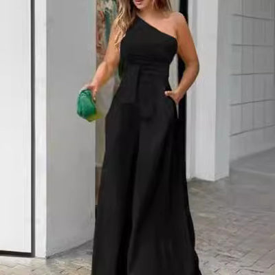 spring/summer asymmetrical off-shoulder high-waisted wide-leg jumpsuit with one-shoulder tie and pocket detail