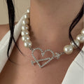 Wholesale women's necklace accessories: european and american cross-border light luxury high-end jewelry, diamond-studded heart choker, pearl sweater necklace