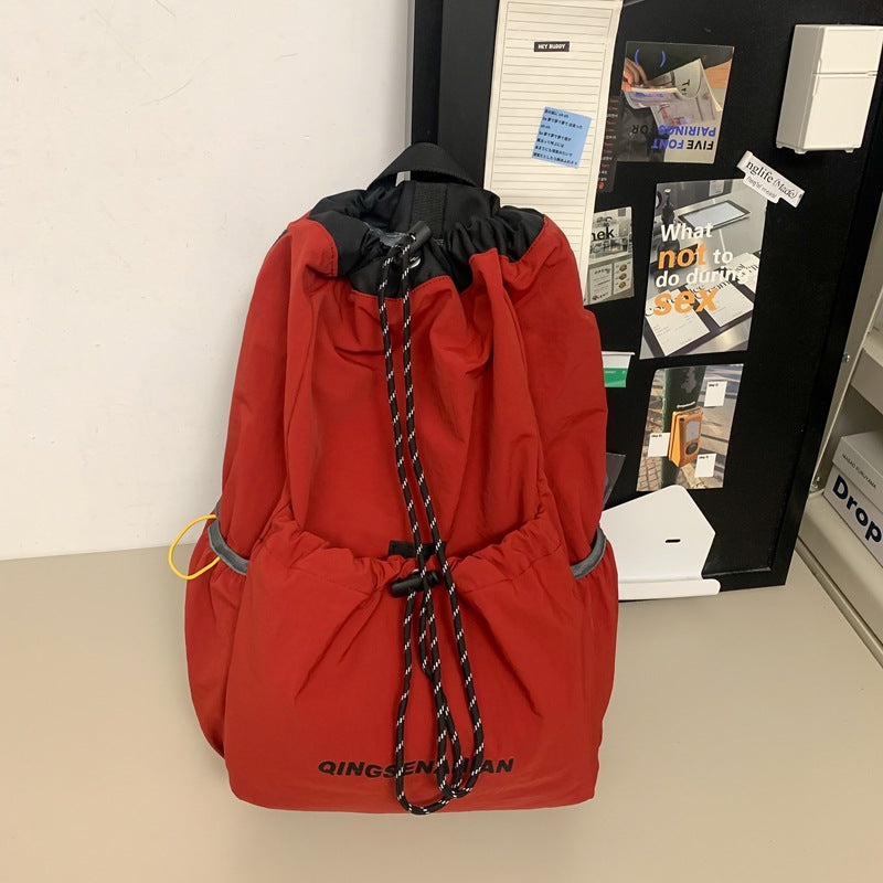 New Korean version drawstring retro backpack, lightweight and trendy junior high school student schoolbag, sports outdoor travel backpack